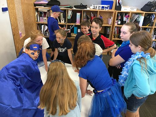 Kahu Kiwi plans their chant and strategy