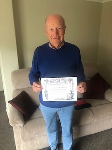 Robert Curd, JP (Retired) with his certificate