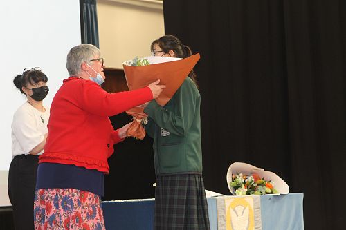 Head Prefect, Helen Li, is commissioned by Mrs Pauline Duthie
