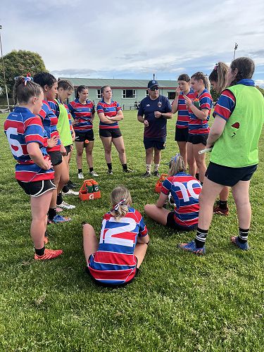 Half time team talk with coach Andrew Rowland
