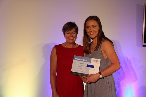 Chief Operating Officer Philippa Jones presents Amelia Calder with her Lincoln University Blue for Hockey