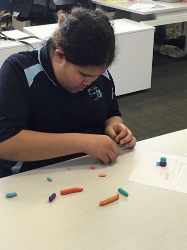 Waipuna creating her Hey Warrior