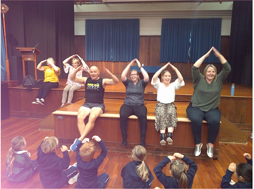 Junior School teachers joining in with Brett.