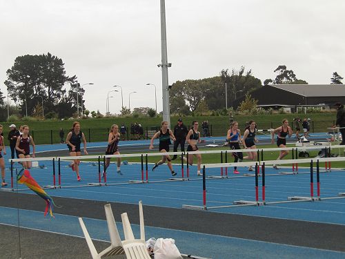 Bethany Oudemans in Lane 6 of Under 15 hurdles