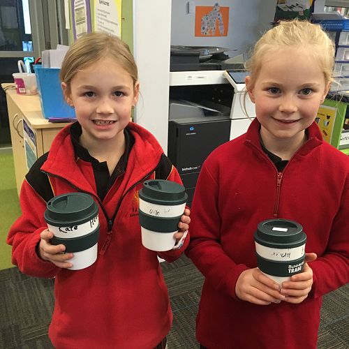 Reusable coffee mugs in use in Orongomai. 