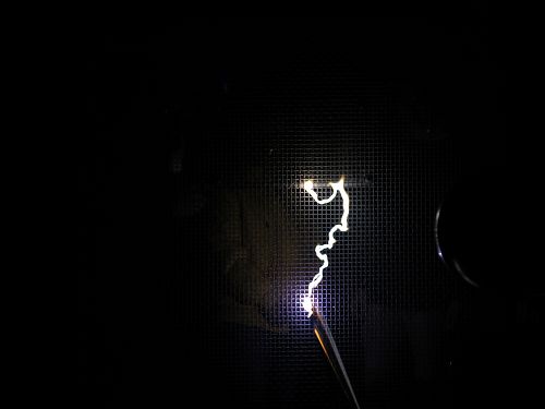 Plasma arc on the Faraday cage