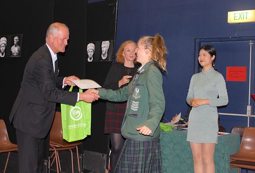 Joelle Gatenby receives her prize