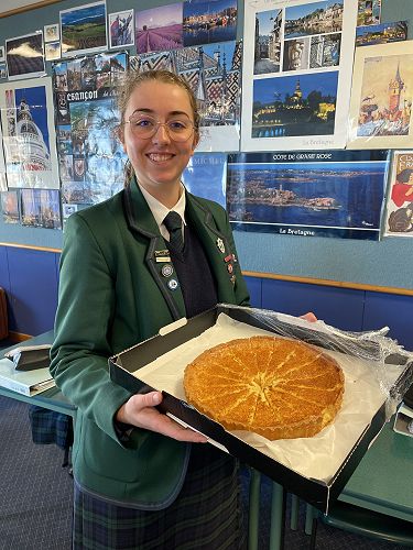 Zoe McElrea proudly showing off her tarte au citron.