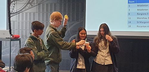 Surya and Johnny working on their solution.