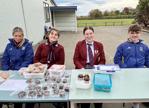 1RST class selling baking to raise funds for Caritas