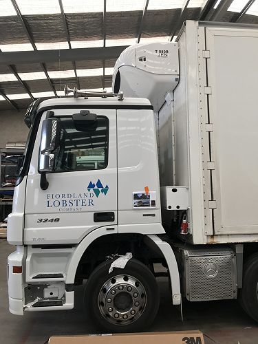 L0BSTR (that's its number plate), with brand new refrigeration unit above the cab.