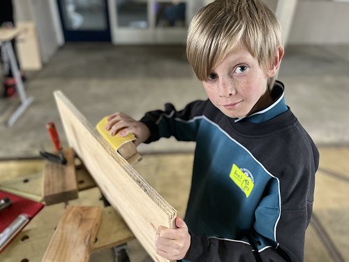 Language Day in Moerewa - Axel making a gutterboard