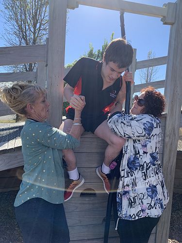 Jayden wanted to go down the flexible rope so Jill and Judy made it happen. 