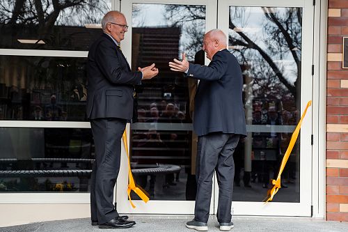 Ribbon cut by John Oliver