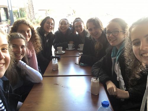 Kiwi girls exploring French café culture.