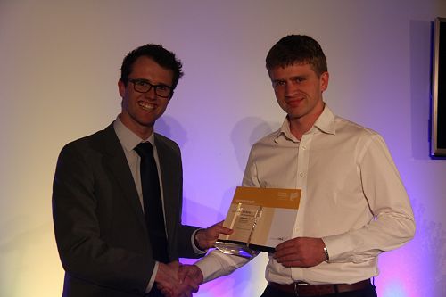 LUSA President Danyon Thomas presents Jan Buter with his Gold Award for University Life