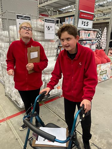 Talia and Owen enjoyed the challenge of locating items in the Warehouse and recording the dollar price. They worked well as a team.