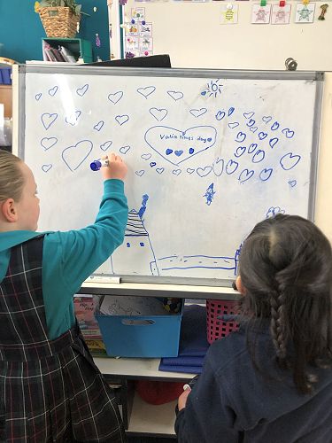 Devyn and Chloe are being artists here and they also told me a story to explain their artwork. From this new language might be learnt, such as the meaning of 'attic'.