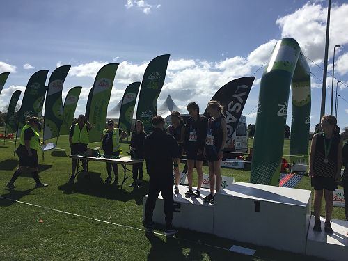 Our winning Y7 team recieving their medals from Commonwealth games athlete Samuel Tanner.