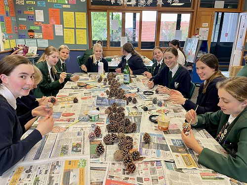 Year 10's painting pinecones