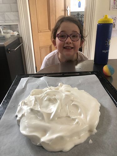 Florence Woodham (Year 2) delighted with her pavlova - ready to go in the oven