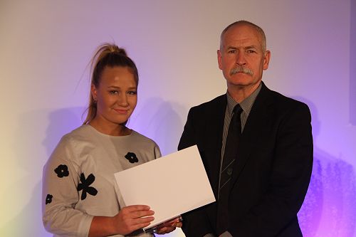 Laura Cockroft receiving her Lincoln University Blue for Rowing from the Chief Academic Officer Professor Bruce McKenzie