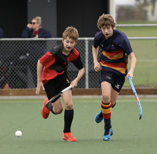 Cooper Ollerenshaw defends the ball
