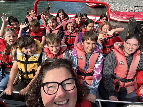 Is Ms. Huxtable or the kids more excited?