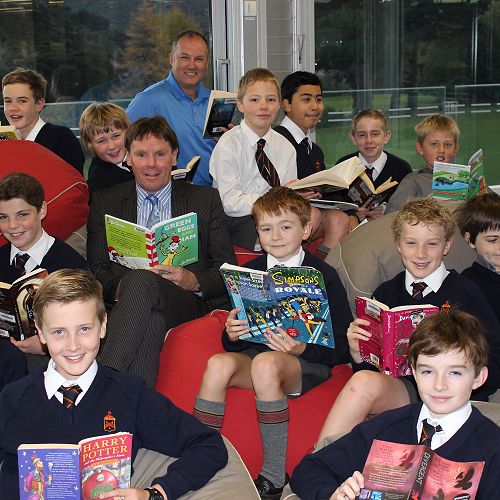 Principal Neil Garry taking part in Go McGlashan Read with Mr Hore's Year 7 class.