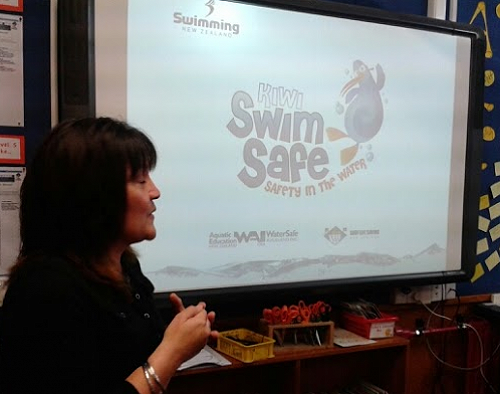 Tracey Hickman, Education Operations Manager of Swimming New Zealand, talking to Merrin parents about the Kiwi Swim Safe Programme.