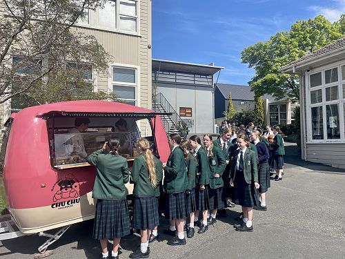 A long line of people waiting. We estimate around 150 staff and students were served in a few hours!