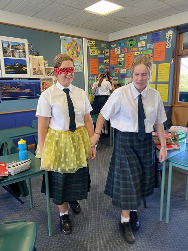 Georgia Clark helped a 'younger' 5 year old version of Laura Moore around the classroom maze