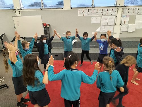  Junior students doing folk dances.