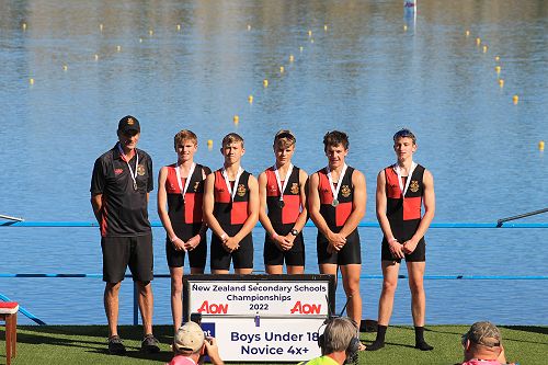 The gold medal winners of the Under 18 Novice Quad. Marty Lowry (coach), Cameron Natta (cox) Sam Gordon, Alex Cooper, Ben Parker, Oliver O'Connor.