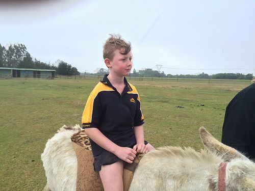 Kolby (riding a different sort of motorbike).