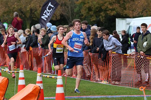 Vaughan Murray, in red, yellow and black, during the Year 9 regional relay.