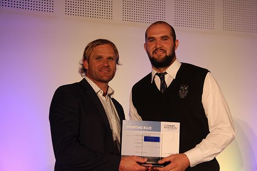 Scott Roberston presents Hamish Dalzell with his Lincoln University Blue for Rugby