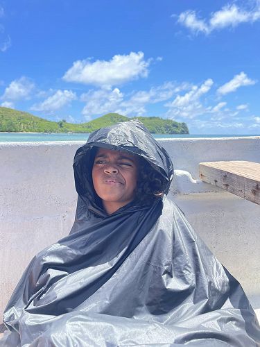 Paulini Banuve on her first visit to her mother's place of birth Daku village, Kia Island, Fiji. On this beach in 1809 Rev Davies preached Hebrew 13:5 and holy communion took place.