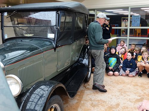 Graham Rae explaining his car details to the students