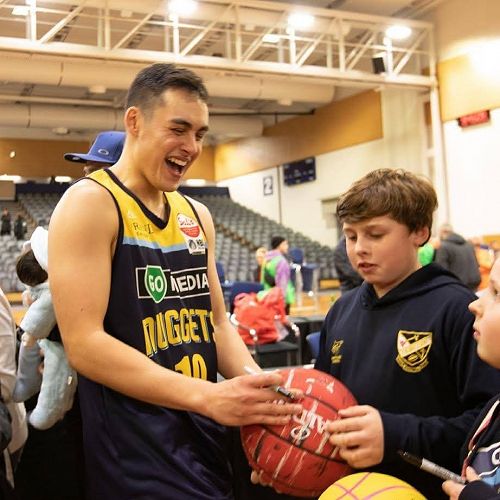 Richie Rodger with Kavanagh students, Louis Bresanello, William and Chelsea Jarvie