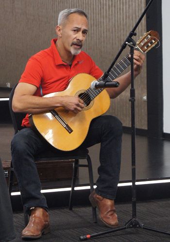 Nathan Tane performs an original song