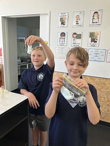 Liam and Alex from room 1 in the science lab.