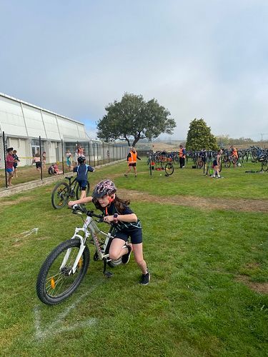 Ruby Tilyard taking off to start biking her 4 laps of the course