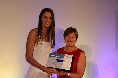 Kate Lloyd receiving her Lincoln University Blue for Netball from Chief Operating Officer Philippa Jones