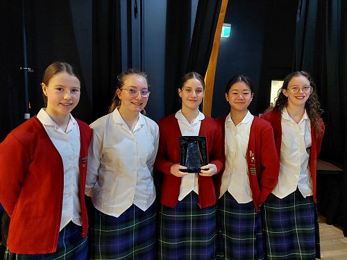 Our successful Swimming team receiving their Top Swimming Team award for being the best team at the NZ Secondary School Championships. 