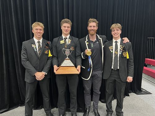 Maadi Cup winning crew members (from left): Toby Smith, Josh Syme, and Ethan Johnson, with Olympic gold medal winning Old Boy, Shaun Kirkham