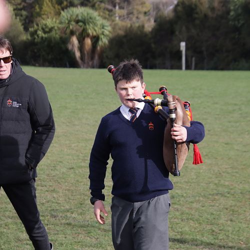 Mac on the bagpipes at the 1st XV game