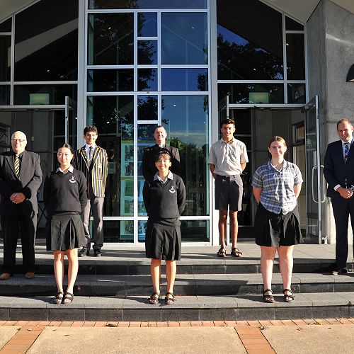 Chappie (left to right), Daniel Williams, Revd Peter Rickman, Christian Fladgate, Headmaster Ben Skeen, Emily Jin, Zoe Chapman and Sam White