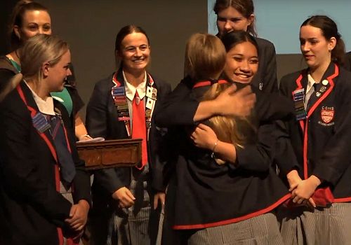Roseanne Tia congratulating Charlotte Cotton