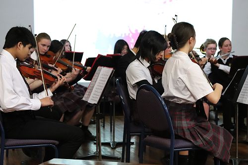 Orchestra Performs at Assembly!